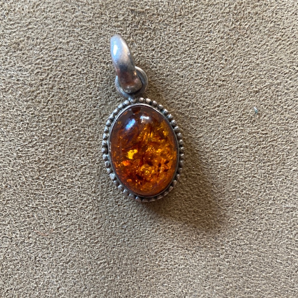 Silver and amber pendant